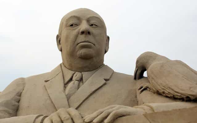 Detail of a sand sculpture of Alfred Hitchcock is seen as pieces are prepared as part of this year's Hollywood themed annual Weston-super-Mare Sand Sculpture festival on March 26, 2013 in Weston-Super-Mare, England. Due to open on Good Friday, currently twenty award winning sand sculptors from across the globe are working to create sand sculptures including Harry Potter, Marilyn Monroe and characters from the Star Wars films as part of the town's very own movie themed festival on the beach. (Photo by Matt Cardy)