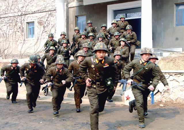 This picture taken on March 6, 2013 by North Korea's official Korean Central News Agency shows soldiers of the Korean People's Army (KPA) in military training at an undisclosed place in North Korea. (Photo by AFP Photo/KCNA via KNS)