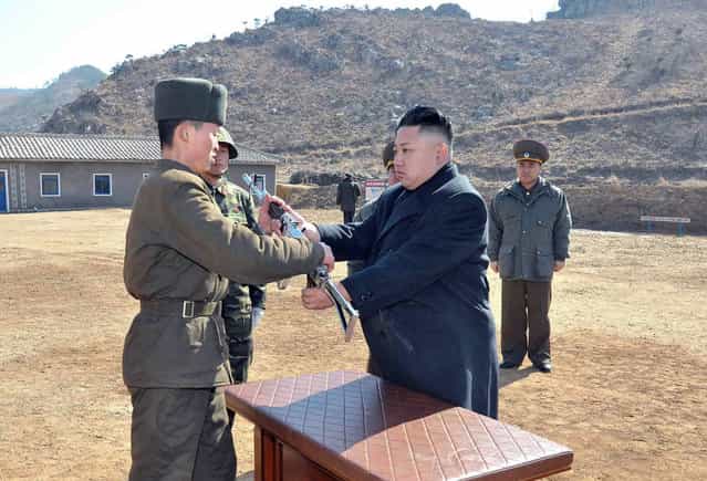 Kim Jong Un inspects a long-range artillery sub-unit of Korean People's Army Unit 641 at undisclosed place in North Korea. (Photo by AFP Photo/KNS)