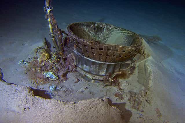 A photograph released by Bezos Expeditions on March 21 shows a thrust chamber from a Saturn 5 rocket's F-1 engine, sitting on the Atlantic Ocean bottom. Remotely operated vehicles recovered the engine components from a depth of 14,000 feet, decades after they plunged into the sea during the Apollo moon missions. The preserved engines eventually will go on display in museums in Washington, D.C., and Seattle. (Photo by Bezos Expeditions via EPA)