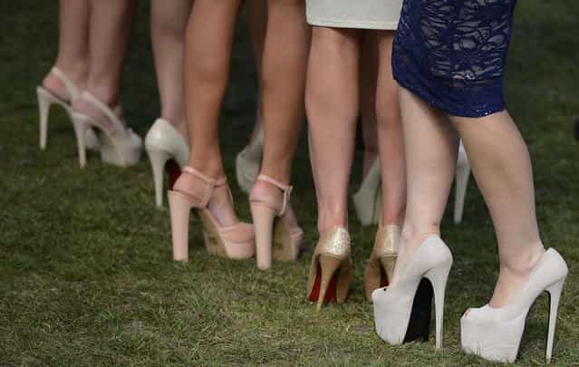 Racegoers shoes are seen as they arrive for the second day of the Grand National meeting at Aintree, northern England April 5, 2013. (Photo by Nigel Roddis/Reuters)