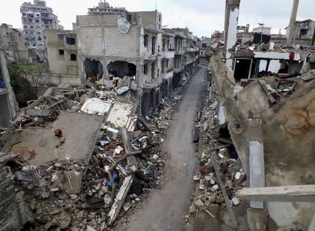 A view of damaged buildings on Abu al-Hol street, Homs, on February 2, 2013. (Photo by Yazen Homsy/Reuters /The Atlantic)