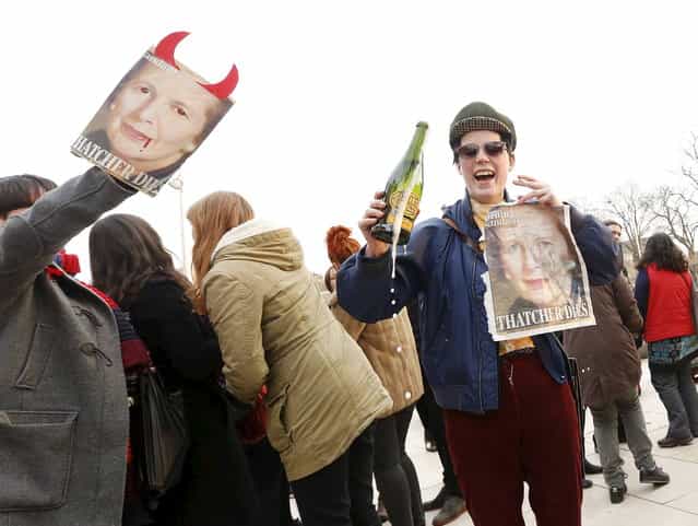 Revellers celebrate the death of Britain's former prime minister Margaret Thatcher in Brixton, south London April 8, 2013. Margaret Thatcher, the [Iron Lady] who transformed Britain and inspired conservatives around the world by radically rolling back the state during her 11 years in power, died on Monday following a stroke. She was 87. (Photo by Olivia Harris/Reuters)