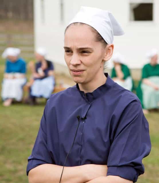 Lovina Miller responds to questions during an interview in Bergholz, Ohio on Tuesday, April 9, 2013. Miller was sentenced to prison for her part in the hair and beard cutting scandal against other Amish members. (Photo by Scott R. Galvin/AP Photo)