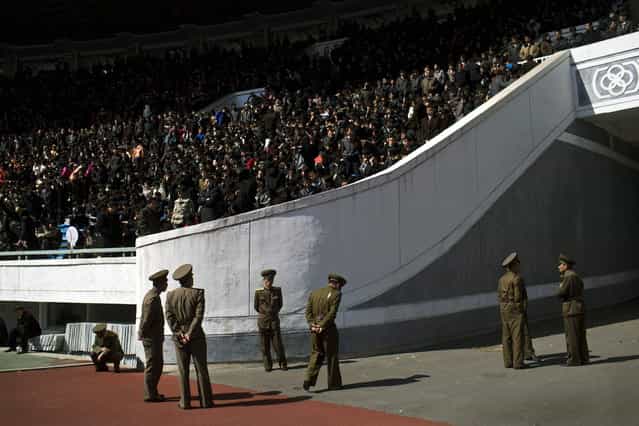 North Korean soldiers stand guard inside Pyongyang's Kim Il Sung Stadium on Sunday, April 14, 2013. North Korea hosted the 26th Mangyongdae Prize Marathon to mark the upcoming April 15, 2013 birthday of the late leader Kim Il Sung. (Photo by David Guttenfelder/AP Photo)