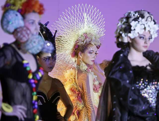 Models present costume designs and hairstyles during the 7th international festival of hairdressing art, fashion and design called [Crystal Angel] in Kiev, April 18, 2013. (Photo by Gleb Garanich/Reuters)