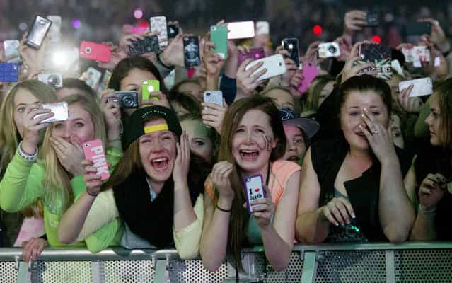Young fans of Canadian singer Justin Bieber attend his concert as part of the [Believe Tour] at Telenor Arena in Fornebu, Norway on April 16, 2013. (Photo by Daniel Sannum Lauten/AFP Photo)