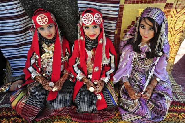 Girls wearing folk costumes participate in the Carnival Benghazi Capital of Culture 2013 in Benghazi, Libya, on April 18, 2013. (Photo by Esam Al-Fetori/Reuters)