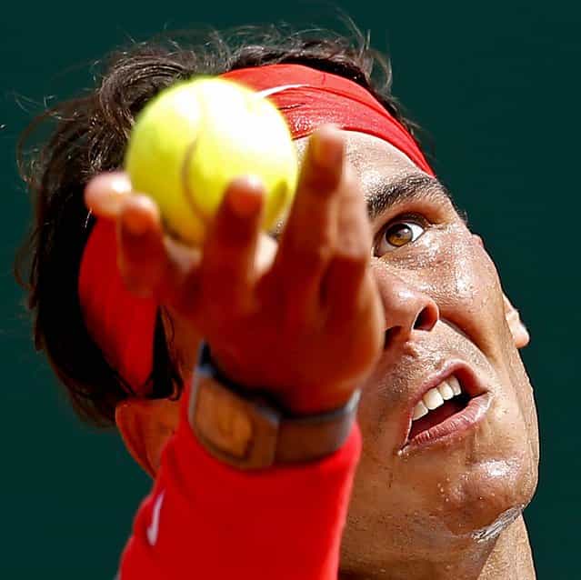 Spain's Rafael Nadal serves the ball to Marinko Matosevic of Australia during their match of the Monte Carlo Tennis Masters tournament in Monaco, on April 17, 2013. (Photo by Lionel Cironneau/Associated Press)