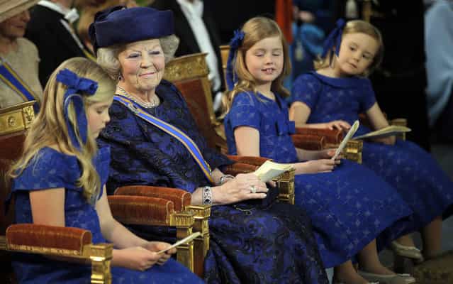 The former queen and her granddaughters Amalia (left), Ariane and Alexia (right) can be seen here awaiting the grand entry of the royal couple at the church, on April 30, 2013. (Photo by Peter Dejong/Reuters)
