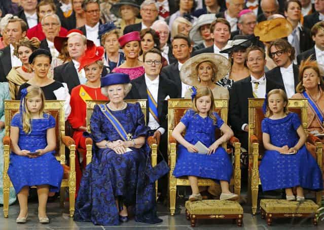 Netherlands Princess Beatrix (2nd L) accompanied by her granddaughters Crown Princess Catharina-Amalia (L) Princess Alexia and Princess Ariane (R) attend the religious crowning cerimonies at the Nieuwe Kerk church in Amsterdam April 30, 2013. The Netherlands is celebrating Queen's Day on Tuesday, which also marks the abdication of Queen Beatrix and the investiture of her eldest son Willem-Alexander. (Photo by Michael Kooren/Reuters)
