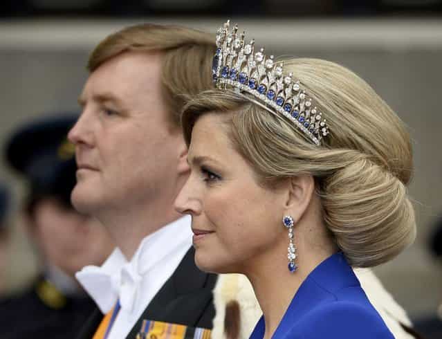 Dutch King Willem-Alexander and his wife Queen Maxima leave Nieuwe Kerk church after the religious crowning ceremony in Amsterdam April 30, 2013. Queen Beatrix of the Netherlands abdicated on Tuesday, handing over to her eldest son, Willem-Alexander, who became the first King of the Netherlands in over 120 years. (Photo by Dylan Martinez/Reuters)