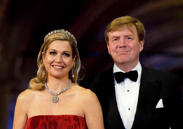 Dutch Crown Prince Willem-Alexander (R) and his wife Crown Princess Maxima arrive at a gala dinner organised on the eve of the abdication of Queen Beatrix of the Netherlands and the inauguration of her successor King Willem-Alexander at the Rijksmuseum in Amsterdam April 29, 2013. (Photo by Robin Utrecht/Reuters)