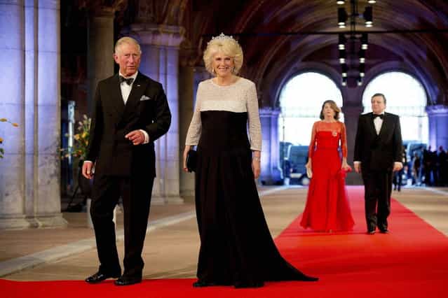 Britain's Prince Charles (L) and his wife Camilla, Duchess of Cornwall, arrive at a gala dinner organised on the eve of the abdication of Queen Beatrix of the Netherlands and the inauguration of her successor King Willem-Alexander at the Rijksmuseum in Amsterdam April 29, 2013. (Photo by Robin Utrecht/Reuters)