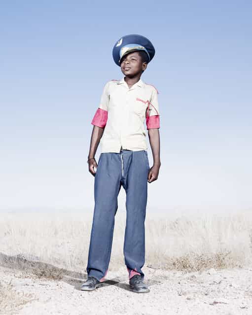Herero cadet with blue hat, 2012. (Photo by Jim Naughten, courtesy of Klompching Gallery, New York)