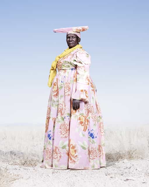 Herero Woman in Pink and Pattern Dress, 2012. (Photo by Jim Naughten, courtesy of Klompching Gallery, New York)
