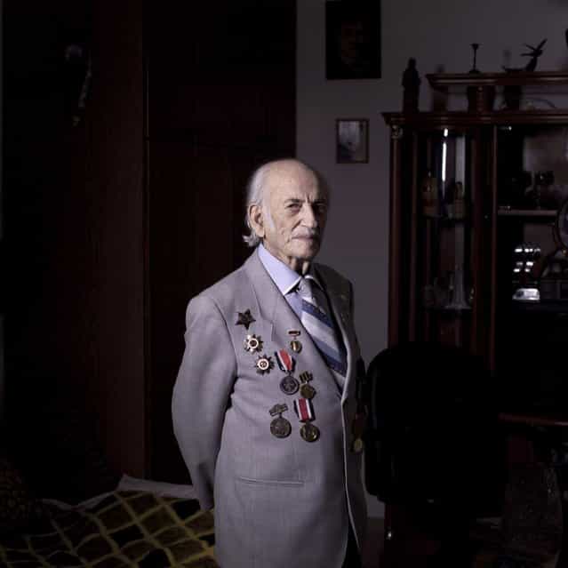 In this photo made Friday, April 12, 2013, Soviet Jewish World War Two veteran Semion Tzvang 89, poses for a portrait at his house in the southern Israeli city of Ashkelon. Tzvang joined the Red Army in 1941 and served in the First Ukrainian Front, a Soviet army group. He fought in Kiev, Prague and Berlin. Tzvang immigrated to Israel in 1991. About 500,000 Soviet Jews served in the Red Army during World War Two, and the majority of those still alive today live in Israel. (Photo by Oded Balilty/AP Photo)