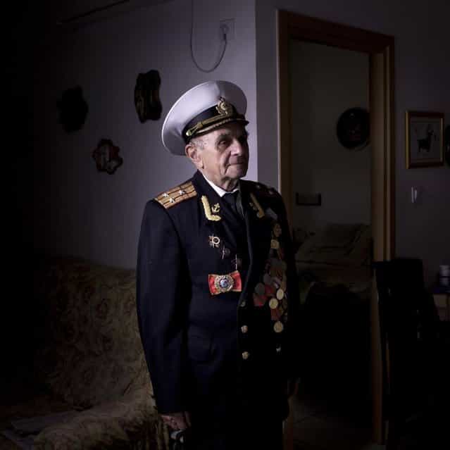 In this photo made Thursday, April 18, 2013, Soviet Jewish World War Two veteran Orlov Naum, 88, poses for a portrait at his house in central Israeli city of Rishon Lezion. Naum joined the Red Army in 1943 after two years of evacuation from Odessa in Kazahstan. He served in 3rd Guard Tank Army at the Voronezh front as an infantry soldier and took part in battle of Kiev and later in battles in Berlin and Prague. During the last days of the war, he was in Prague. After the war, he continued military service in the Navy, served in cruisers Nahimov and Kuibyshev. He immigrated to Israel from Kishinev in 1990. About 500,000 Soviet Jews served in the Red Army during World War Two, and the majority of those still alive today live in Israel. (Photo by Oded Balilty/AP Photo)