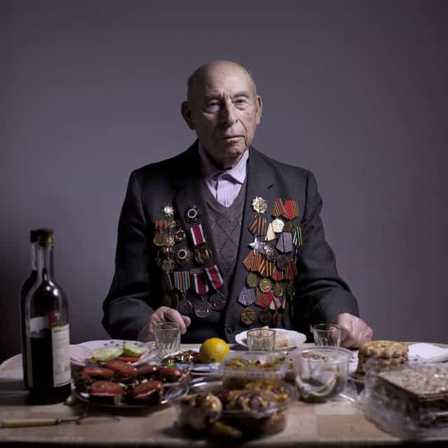 In this photo made Thursday, April 11, 2013, Soviet Jewish World War Two veteran Boris Ginsburg poses for a portrait at his house in the southern Israeli city of Ashdod. Ginsburg, born in Belorussia, was kept by a German garrison in the Lenin ghetto since 1941 until its destruction by partisan units in September 1942. In 1942 he joined the partisans for two years and in 1944 he joined the Red Army as a combat soldier and fought till the and of the war. Ginsubrg demobilized in 1947 and immigrated to Israel in 2001. About 500,000 Soviet Jews served in the Red Army during World War Two, and the majority of those still alive today live in Israel. (Photo by Oded Balilty/AP Photo)