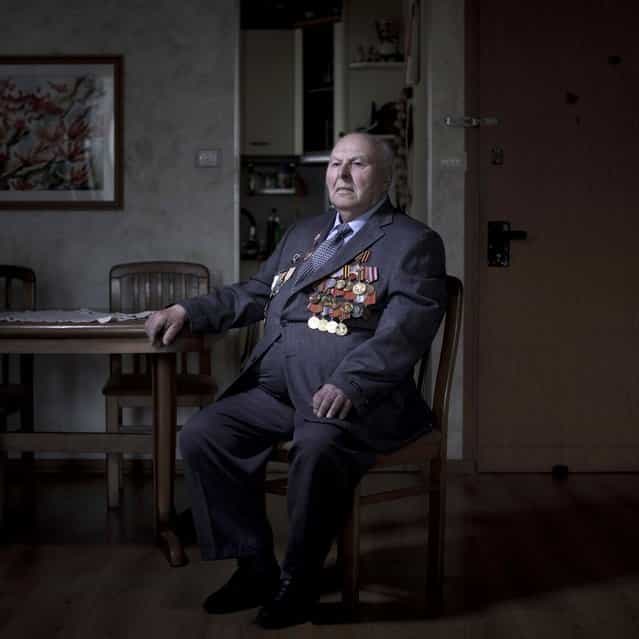 In this photo made Thursday, April 11, 2013, Soviet Jewish World War Two veteran Gregory Stinman, 87, poses for a portrait at his house in the southern Israeli city of Ashdod. Stinman joined the Red Army in 1943 and served in the First Belorussian Front, a Soviet formation equivalent to an Army group, until he was wounded on January 23, 1945. Stinman demobilized in 1950 and immigrated to Israel in 1991 from Belorussia. About 500,000 Soviet Jews served in the Red Army during World War Two, and the majority of those still alive today live in Israel. (Photo by Oded Balilty/AP Photo)