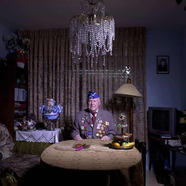 In this photo made Wednesday, April 17, 2013, Soviet Jewish World War Two veteran Michael Sandler, 93, poses for a portrait at his house in Jerusalem, Israel. Sandler joined the Red Army, in 1939, serve the 3rd Guards Tank Army, 91st Separate Tank Brigade; in Stalingrad, then in Berlin and Prague until the end of the war. Sandler immigrated to Israel in 1991. About 500,000 Soviet Jews served in the Red Army during World War Two, and the majority of those still alive today live in Israel. (Photo by Oded Balilty/AP Photo)
