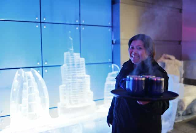 A waitress serves hot chocolate at Chillout cafe in Dubai May 12, 2013. (Photo by Ahmed Jadallah/Reuters)