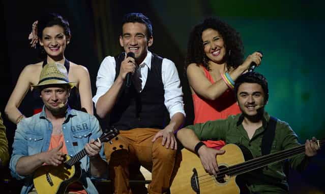 Malta's Gianluca (C) performs during the final of the 2013 Eurovision Song Contest in Malmo, Sweden, on May 18, 2013. (Photo by John MacDougall/AFP Photo)
