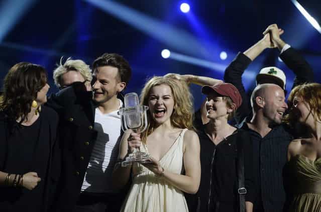 Emmelie de Forest (C) of Denmark celebrates holding her trophy after she won the 2013 Eurovision Song Contest with her song [Only Teardrops] at the Malmo Opera Hall in Malmo May 18, 2013. (Photo by Jessica Gow/Reuters/Scanpix)
