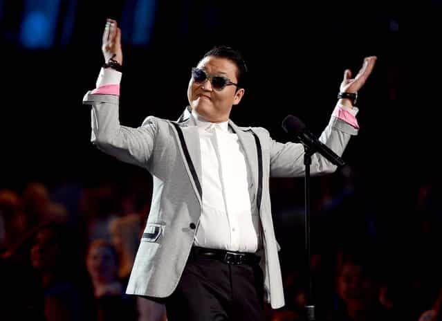 Psy speaks during the 2013 Billboard Music Awards. (Photo by Ethan Miller/Getty Images)