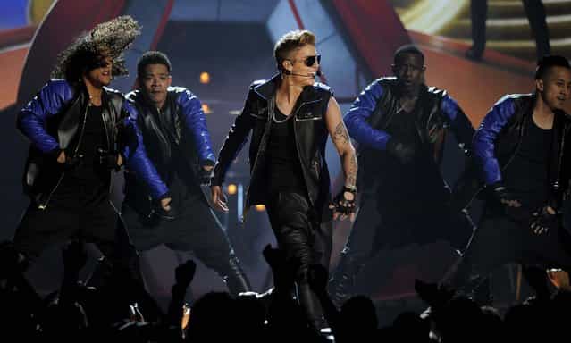 Justin Bieber performs during the show. (Photo by Chris Pizzello/Invision)
