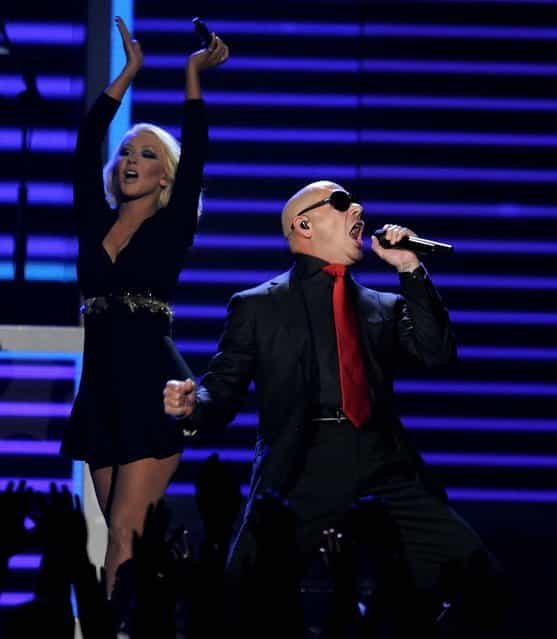 Christina Aguilera and Pitbull performs during the show. (Photo by Chris Pizzello/Invision)