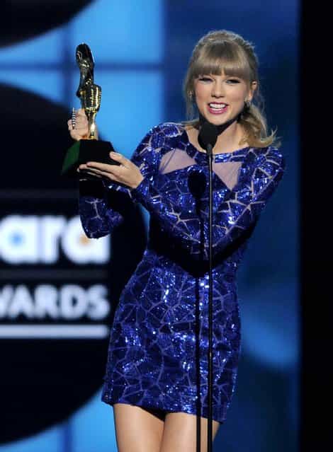 Taylor Swift accepts the award for top Billboard 200 album for [Red]. (Photo by Chris Pizzello/Invision)