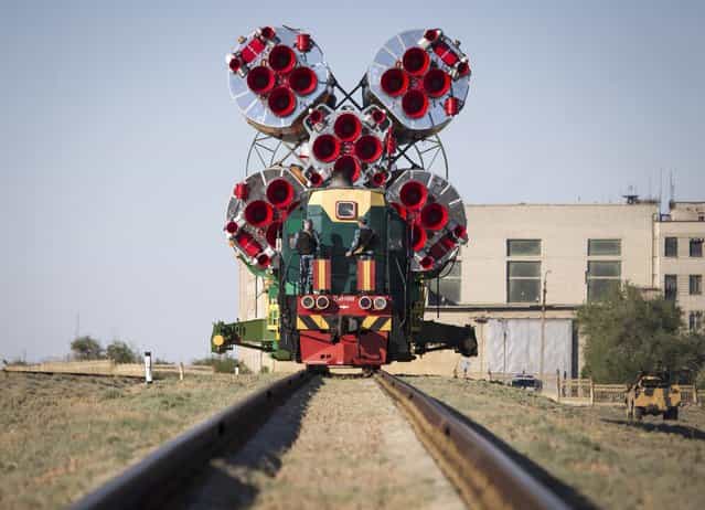 The Soyuz TMA-09M spacecraft is transported to its launch pad at Baikonur cosmodrome May 26, 2013. Soyuz with U.S. astronaut Karen Nyber, Italian astronaut Luca Parmitano and Russian cosmonaut Fyodor Yurchikhin is due to travel to the International Space Station on May 29. (Photo by Shamil Zhumatov/Reuters)