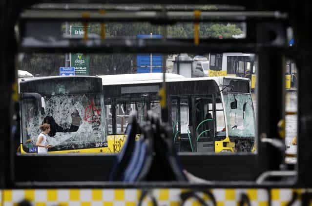 Damaged buses are seen in Taksim where police and anti-government protesters clashed in central Istanbul June 2, 2013. (Photo by Murad Sezer/Reuters)