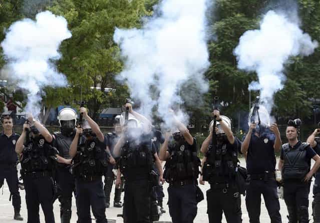 Riot police fire tear gas during a protest against Turkey's Prime Minister Tayyip Erdogan and his ruling AK Party in central Ankara June 2, 2013. (Photo by Reuters/Stringer)