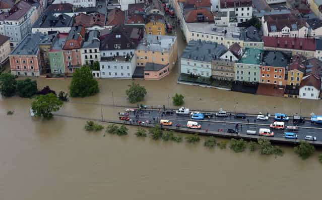 An aerial view of the overflooded Germany city of Passau on June 3, 2013. (Photo by Peter Kneffel/AFP Photo)