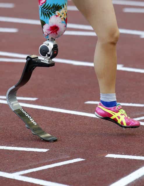 Hitomi Onishi of Japan prepares to start in the women’s 100-meter Paralympic event at the Golden Gala IAAF Diamond League at the Olympic stadium in Rome, on June 6, 2013. (Photo by Reuters)