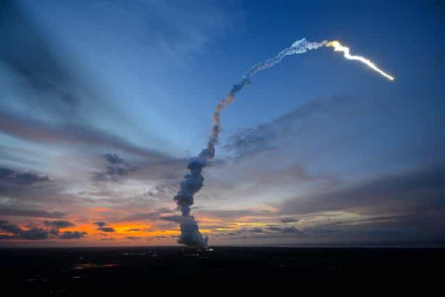 In this handout photo provided by the European Space Agency (ESA), Arianespace's unmanned Ariane 5 rocket, carrying the automated transfer vehicle (ATV) Albert Einstein, lifts off June 5, 2013 in Kourou, French Guiana along South America's northeast coast. The ATV will resupply the International Space Station with 14,500 pounds of propellant, food, experiments, water and oxygen. The mission marks the heaviest payload ever lifted by an Ariane rocket. (Photo by Stephane Corvaja/ESA via Getty Images)