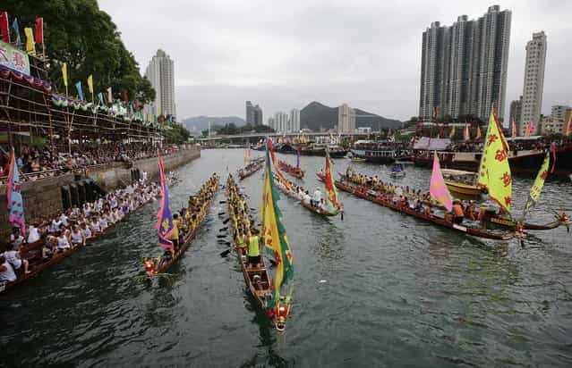 Crowds line the shore during the Aberdeen Dragon Boat Races in Hong Kong. (Photo by Jessica Hromas/Getty Images)