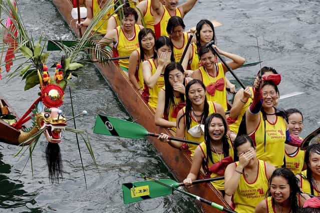 Competitors line up their boats for some formalities during the Aberdeen Dragon Boat Races. (Photo by Jessica Hromas/Getty Images)