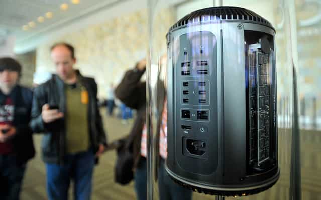 The new cylindrical Mac Pro on display at Apple's Worldwide Developer Conference in San Francisco, on June 11, 2013. (Photo by Josh Edelson/AFP Photo)