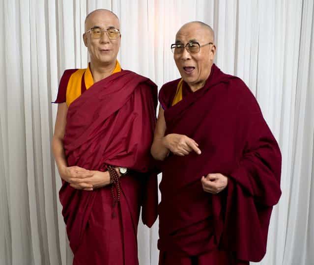 His Holiness the Dalai Lama visits Madame Tussauds and poses with a wax figure of himself in Sydney, Australia, on June 14, 2013. (Photo by Madame Tussauds/Getty Images)
