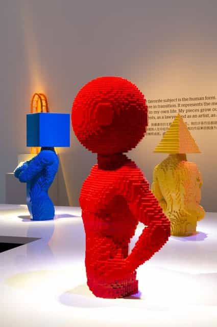 [A trio of torsos with shapes for heads]. (Photo by Nathan Sawaya/The Art of the Brick)