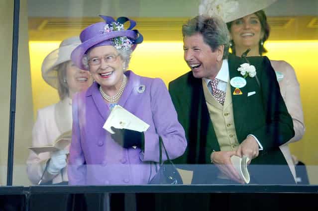 Britain's Queen Elizabeth II with her racing manager John Warren react after her horse, Estimate, won the Gold Cup on day three of the Royal Ascot meeting at Ascot Racecourse, England, Thursday June 20, 2013. (Photo by Tim Ireland/AP Photo/PA)