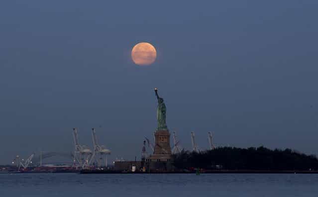 The Statue of Liberty in New York, on Sunday. (Photo by Julio Cortez/Associated Press)