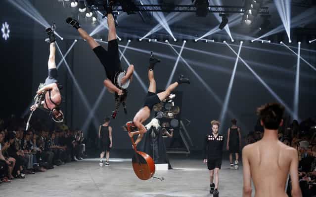For his spring 2014 show, designer Rick Owens asked [scary, sleazy, and over the top] Estonian hardcore punk band and Eurovision 2013 contestants, Winny Puuh, to share the runway – or, at least, the space above the runway. (Photo by Patrick Kovarik)