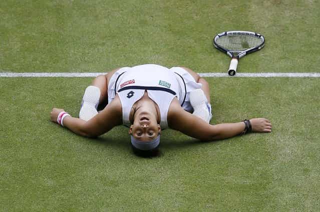 Marion Bartoli reacts after defeating Kirsten Flipkens in their Women's singles semifinal match at the All England Lawn Tennis Championships in Wimbledon, on July 4, 2013. (Photo by Kirsty Wigglesworth/Associated Press)
