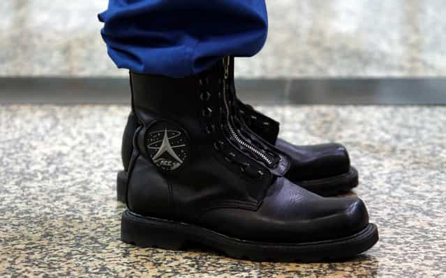 Chinese astronaut Fei Junlong's boots, during a media tour of the China Astronaut Center at Beijing Aerospace City, on April 29, 2011. (Photo by David Gray/Reuters via The Atlantic)