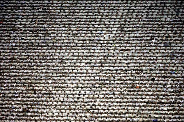 Thousands of North Koreans participate in the [Arirang] mass games in Pyongyang, on July 22, 2013. (Photo by Wong Maye-E/Associated Press)