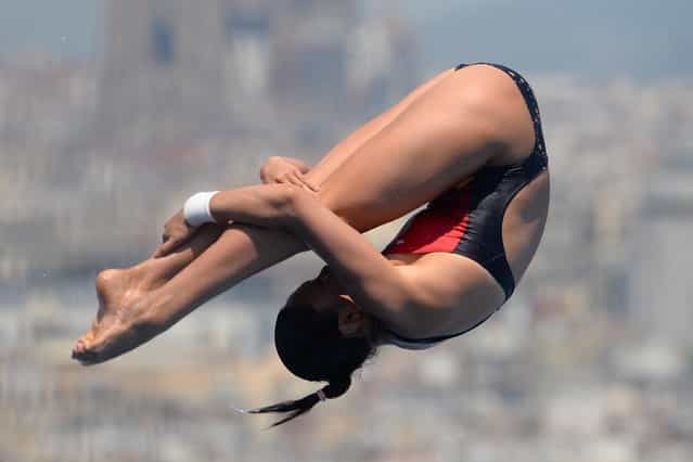 China's Wang Han competes in the women's 1-metre springboard final diving event in the FINA World Championships at the Piscina Municipal de Montjuic in Barcelona on July 23, 2013. (Photo by Josep Lago/AFP Photo)